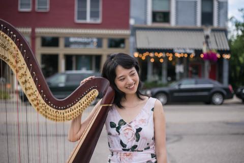Chen-Yu posing with harp