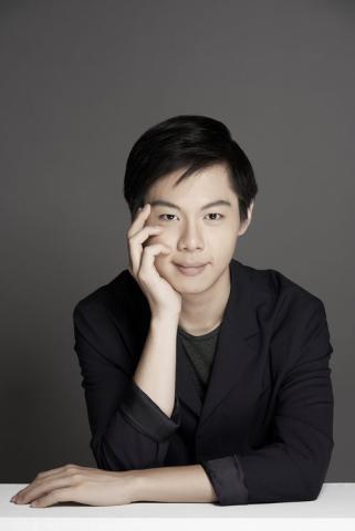 Han Chen on a gray background