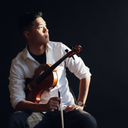 Darren Chan on black background